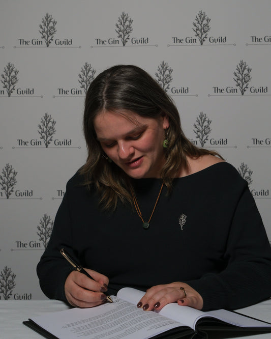 International recognition as Brogan is installed as a life time member of the Gin Guild